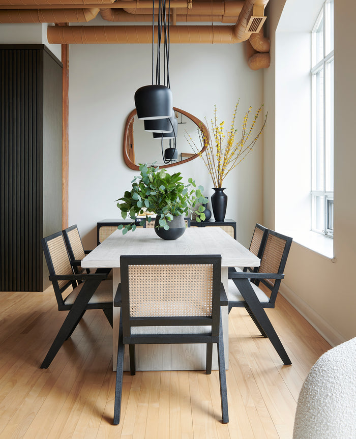 dining room, contemporary dining room, cane dining room chairs, black fixtures, oak furniture