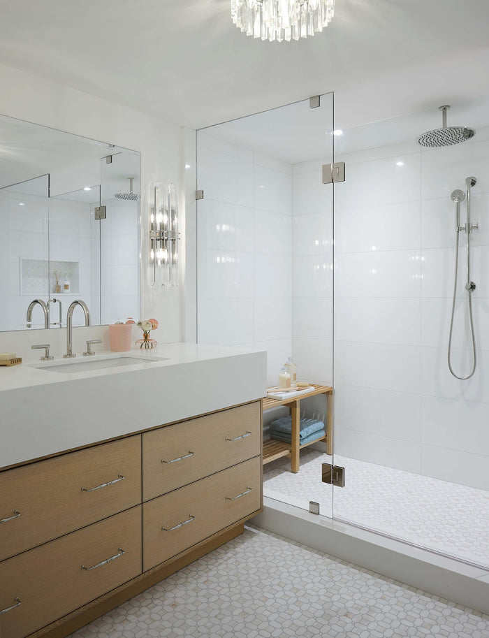 Sophisticated bathroom with rose Dyptique candle