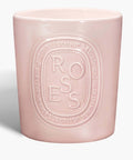 Dyptique rose candle in artisan style holder