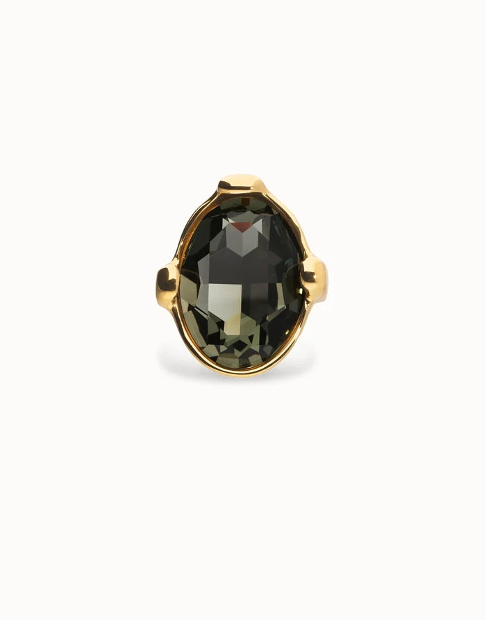 Large ring with oval faceted gray crystal