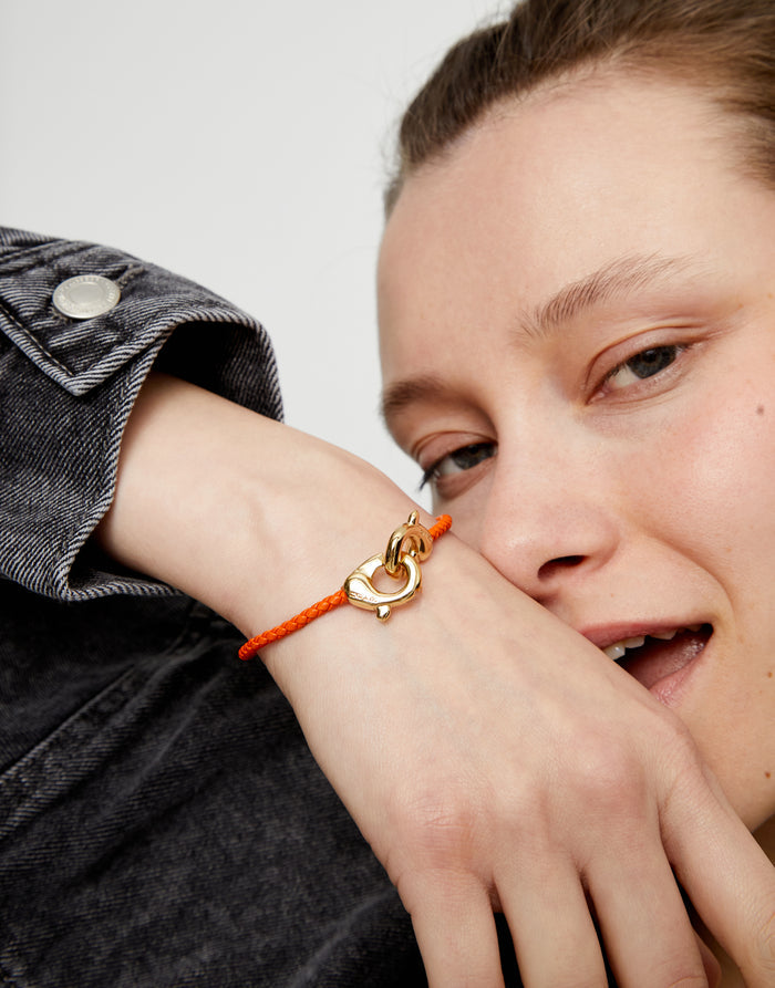 Orange leather bracelet with interlocking carabine