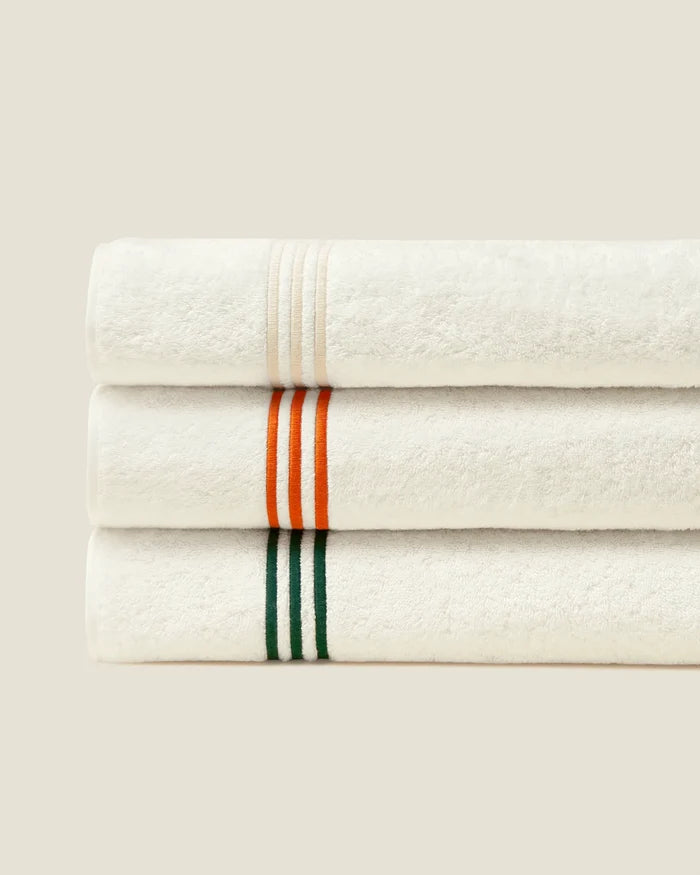 Tre Righe Ivory towels folded and stacked